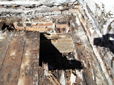 Decayed flat roof before Renewed